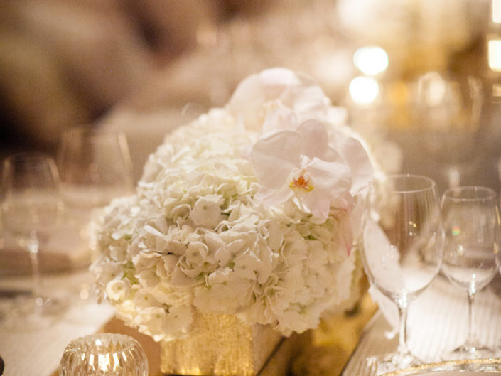 white orchids, floral centerpiece, table layout, candles, gold, vintage, best wedding planners