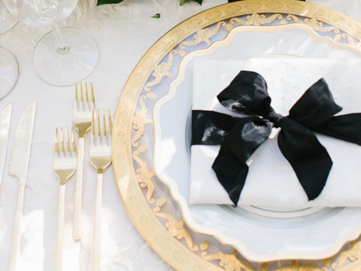 Gold charger, black and white wedding, dinner, tablescape, gold accents, gold decor, gold dinnerware, luxe wedding, gold wedding, wedding design, wedding decor
