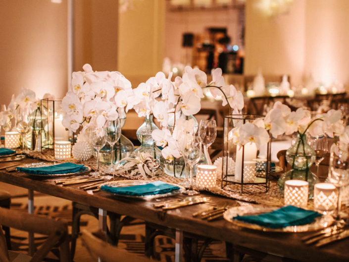 floral, tablescape, centerpiece, white orchid, nautical, blue napkins, candles, metallic accents, reception, party decor, dinner
