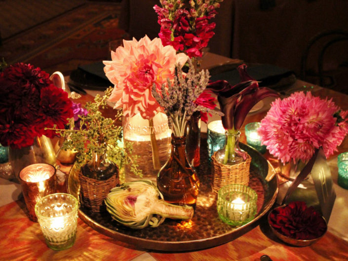 floral arrangement, centerpiece, red, pink, flowers, candles, artichoke, Moroccan, inspired, party decor, event planning, lavender