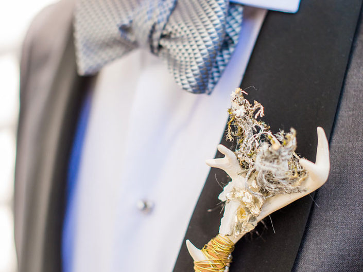 boutonniere, bowtie, grey tuxedo, antler, groom