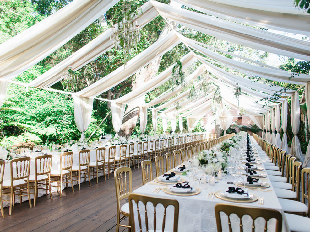 tables cape dinner decor, white and cream florals and chuppah, luxe wedding, black and white accents, kristin banta weddings and special events, los angeles event planner