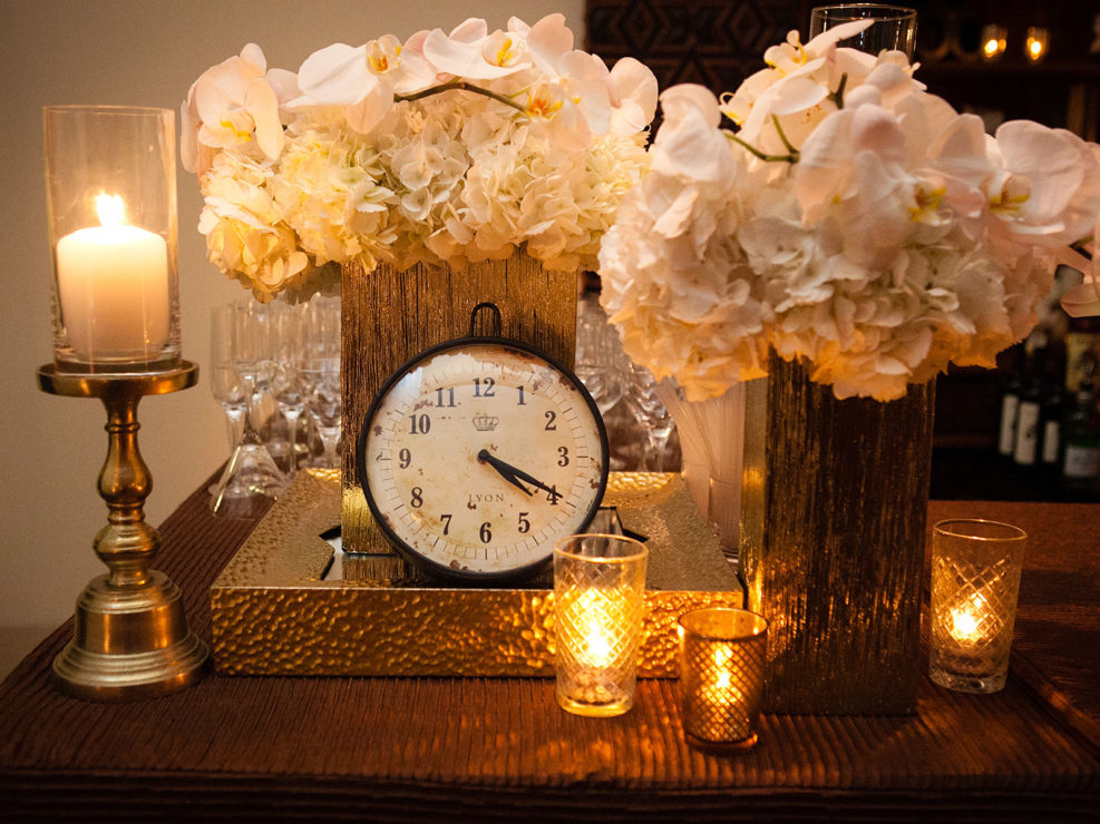 vintage clock, white orchids, flowers, candles, event design, kristin banta events