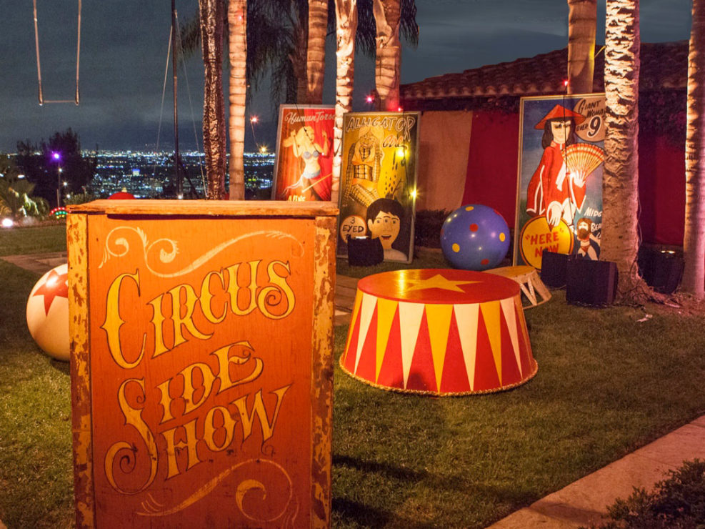 carnival wasteland of expired ride parts, circus balls, circus sideshow, acrobat swing, circus decor, los angeles estate view, kristin banta events, LA event planner