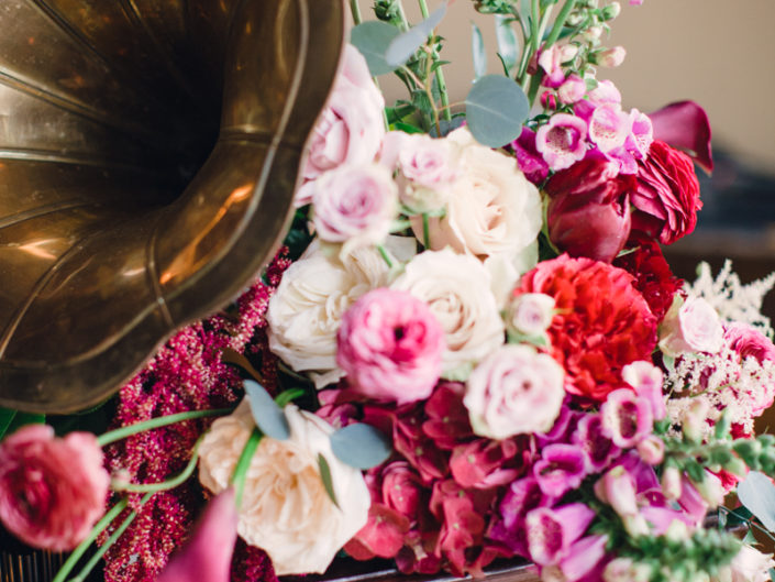 Vintage decor, antique decor, antique design, vintage design, trumpet, vintage music instrament, table decor, table design, event planning, event decor, decorations, vintage themed party, birthday celebration, perch LA, Perch rooftop, floral arrangement, floral design, pink and red flowers