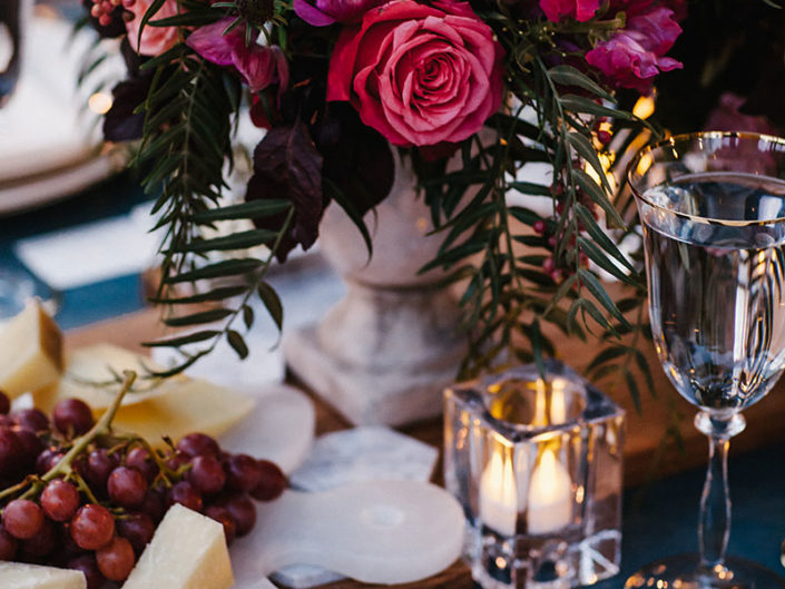 Floral centerpiece, berry floral, pink floral, candles, cheese plate, marble stones, custom napkins, wedding menu, los angeles wedding planning