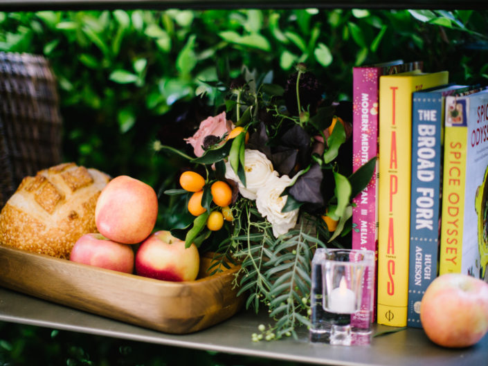 Cocktail Hour Decor, table top decor, bar decor, marketplace, florals, floral accents, fruit, french cafe design, books, Kristin Banta