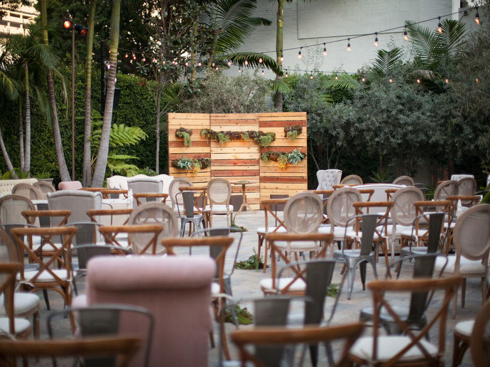 sunset ceremony, urban garden wedding, greenery, wooden chairs, vibiana, kristin banta weddings and special events, LA event planner