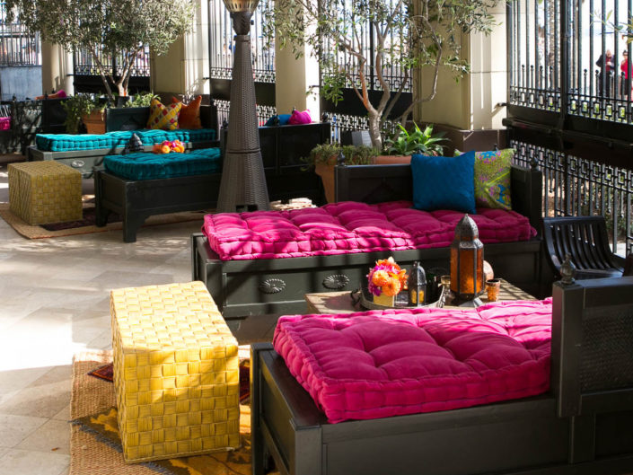 pink florals, lounge vignette, daybed, moroccan engagement party, brilliant floral colors, bright and bold color accents, moroccan styled lanterns, LA event planner, kristin banta