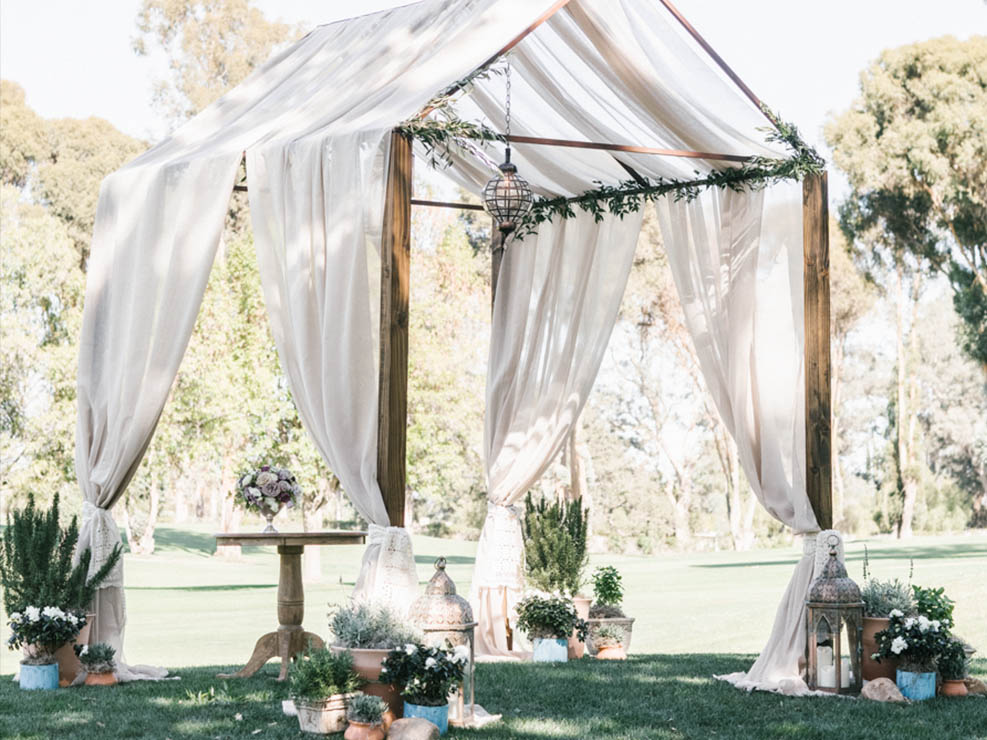 ceremony chuppah, wedding design, greenery, white floral accents, kristin banta weddings and special events