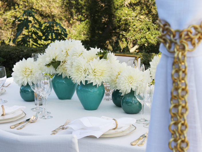 Turquoise Centerpiece, table top decor, white dahlia floral accents, gold chains and cutlery, turquoise vases, LA event planner kristin banta