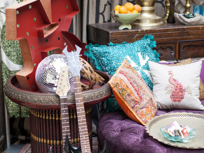 Photoshoot Design, Velvet Furniture, Antique Sign, Electric Guitars, British Flag, Persian Rug, Gold Candle Holder, Mixed Patterns, draped fabric, wooden accents, Los angeles wedding and event planners, LA styled photoshoot