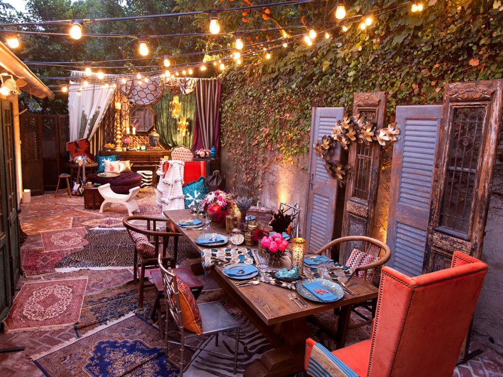Los Angeles Wedding and Event Producer, Inspired Decor, String lights, wooden table, Persian rug, ivy, wooden doors, windows