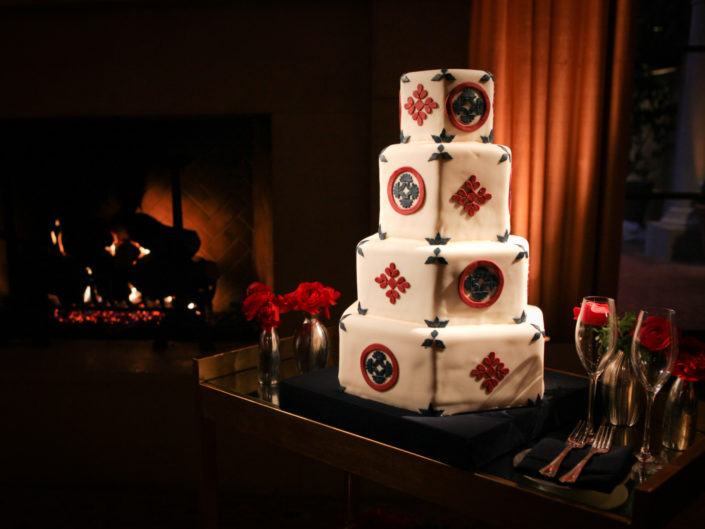 casino royale, wedding cake, red roses, dark, fireplace, wine glass, vintage, masculine, kristin banta events