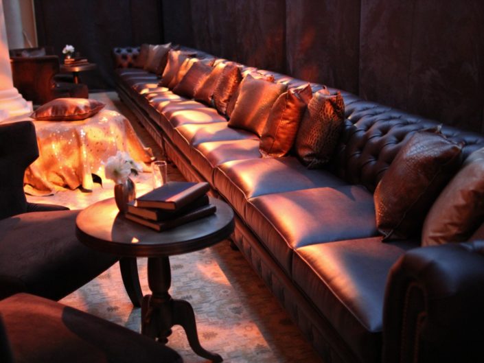 afterparty, books, lounge, dark, masculine, gay wedding, leather couches, plush pillows, la wedding designers