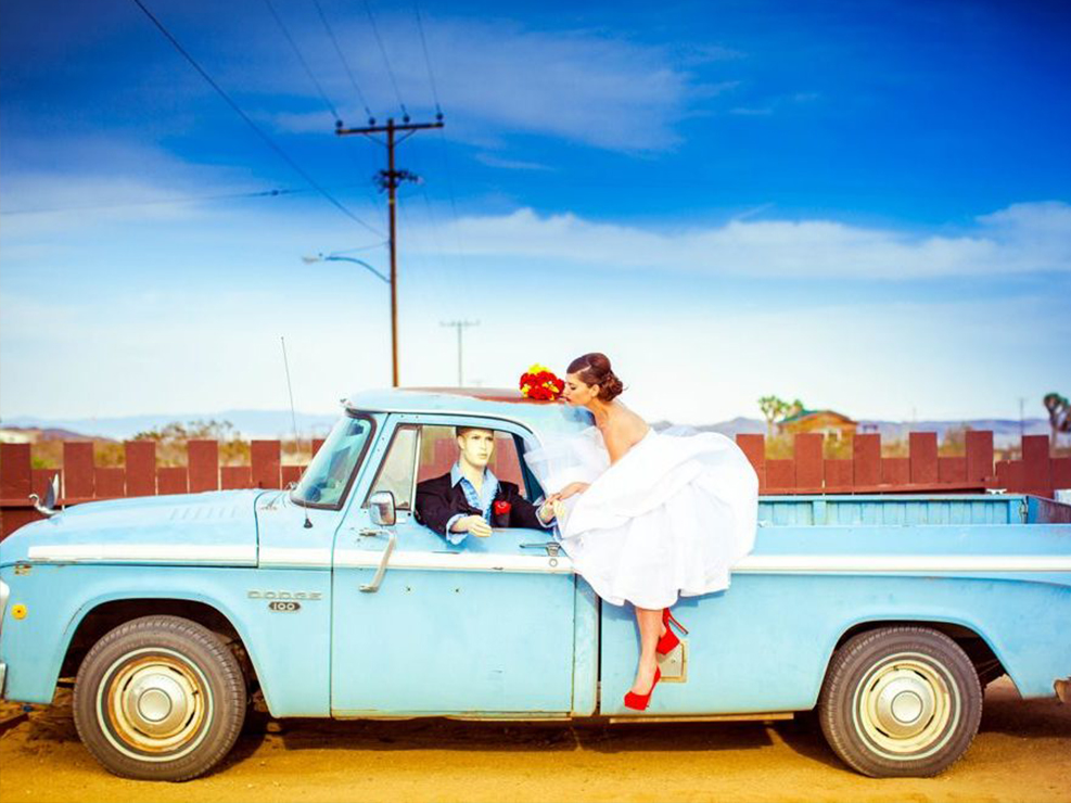 bride and mannequin wedding photoshoot, hyper color, post-apocalyptic desert, kristin banta, los angeles event planner, red accents, blue truck