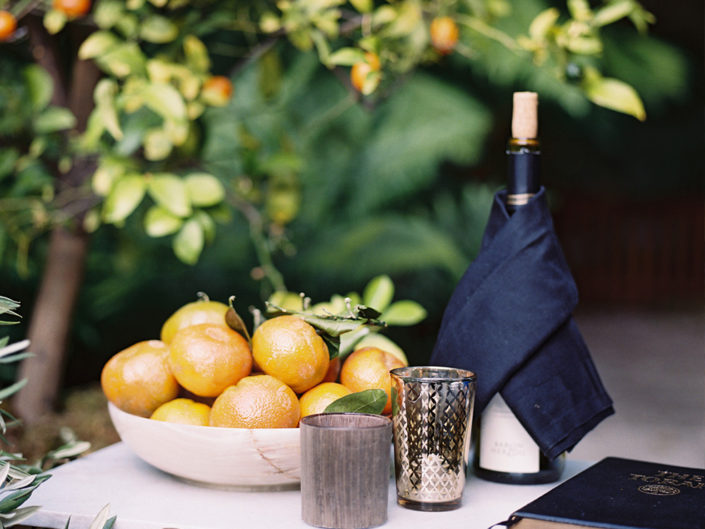 Ceremony Decor, champagne, fruit, orange, greenery, kiddish cup, Kristin Banta Events, LA wedding