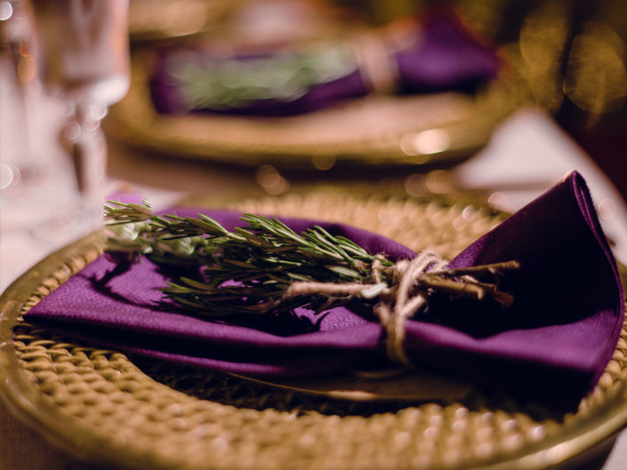dinner setting decor, purple linen, rosemary accent, herb-embellished decor, kristin banta weddings and special events, los angeles event planner