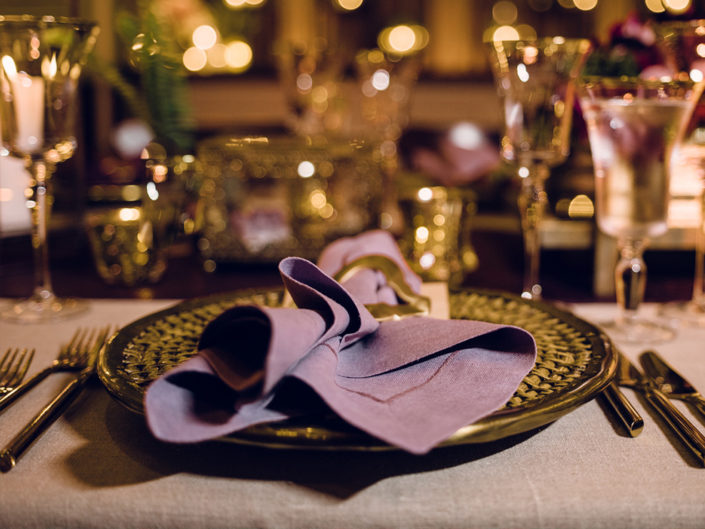 dinner setting decor, purple linen, rosemary accent, herb-embellished decor, kristin banta weddings and special events, los angeles event planner