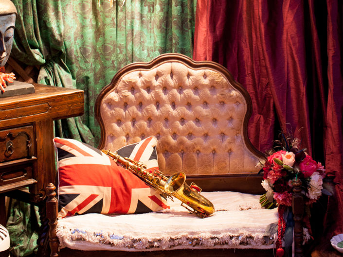 Saxophone, British Flag, Great Britain, Antique Furniture, Cushion, Wooden Accents, Mixed Fabric, Mixed Patterns, Flowers, Flower Bouquet, Buddha, Rock N Roll, ecclectic design, LA event planner, photoshoot in Los Angeles