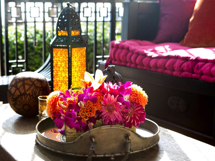pink florals, lounge vignette, daybed, moroccan engagement party, brilliant floral colors, moroccan styled lanterns, LA event planner, kristin banta