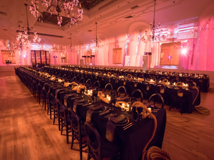 Wedding reception, visual mapping, photo projection, luxe wedding, gay wedding, dining hall, gold accents, black linens, wedding decor, wedding design, Alexandria Ballrooms, produced by Kristin Banta Events